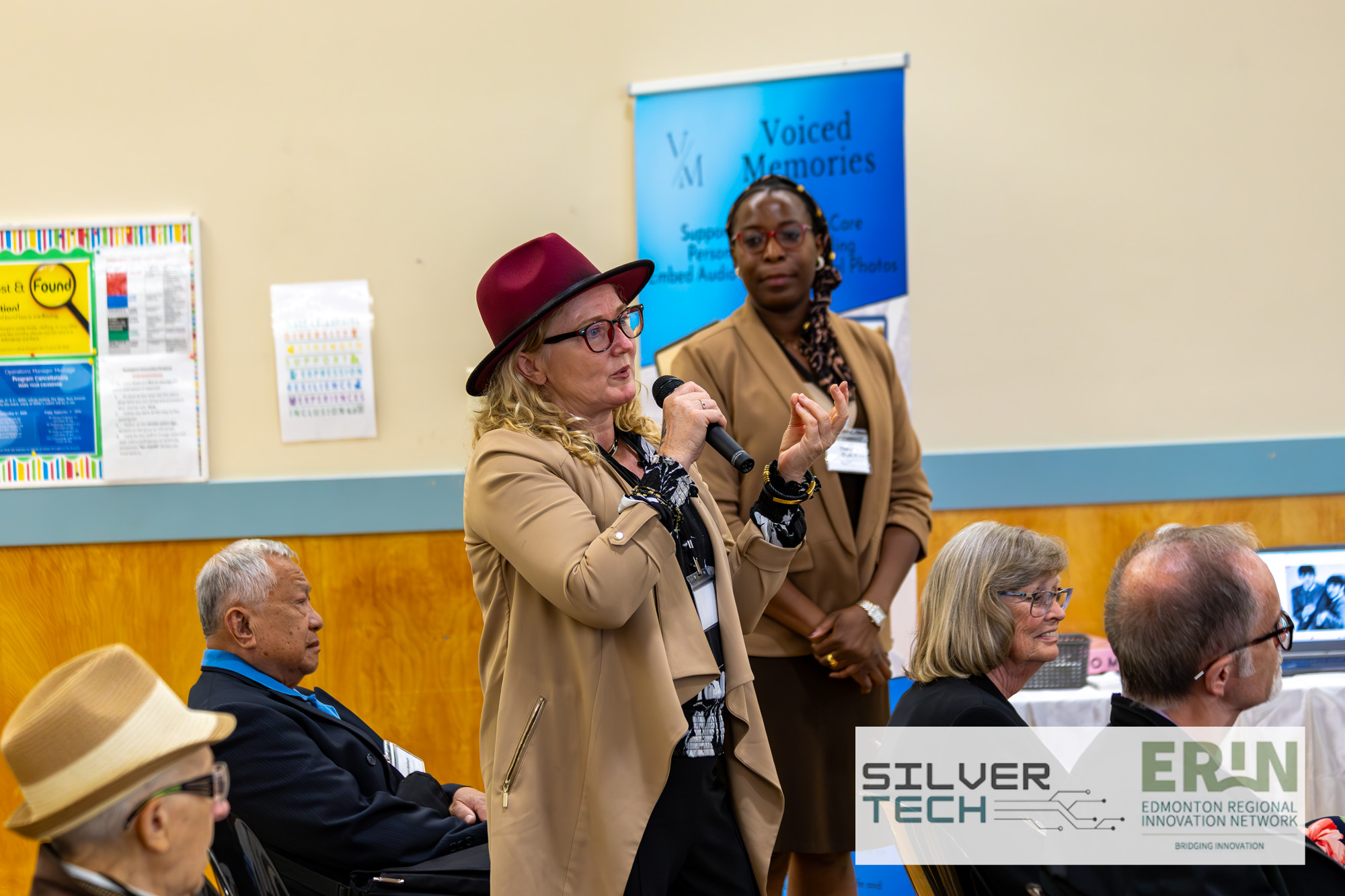 Attendee asking a question during the Voiced Memories breakout at the SilverTech Summit