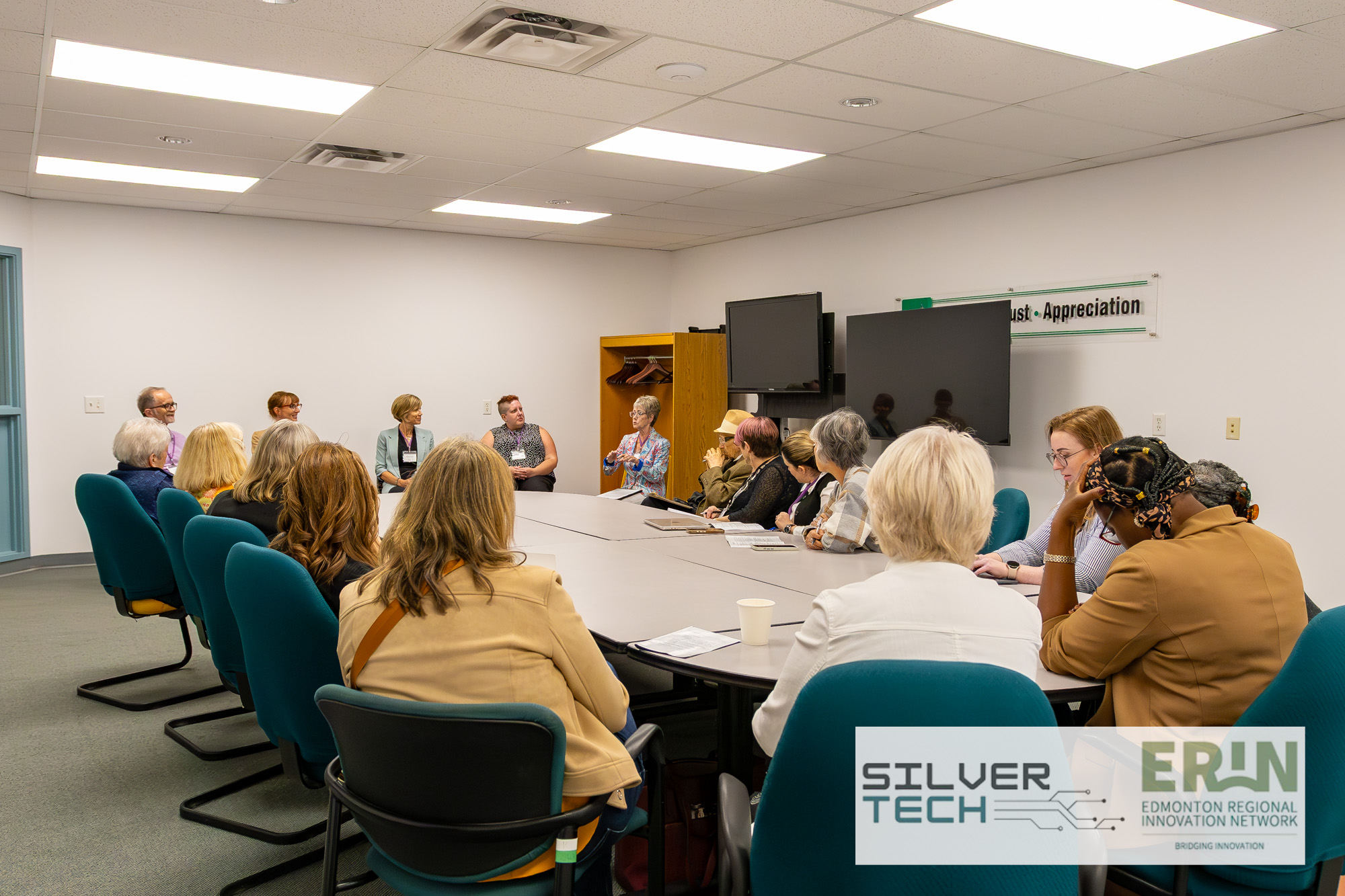 Breakout discussion around a large boardroom table at the SilverTech Summit